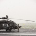 UH-60A Black Hawk Helicopter pre-flight checks and take off in the snow