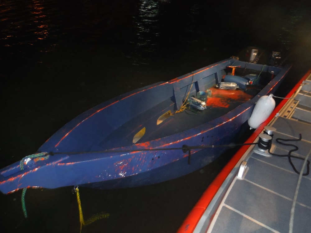 Coast Guard nabs smugglers onboard a coastal freighter and its delivery vessel following drug shipment transfer at sea north of Puerto Rico