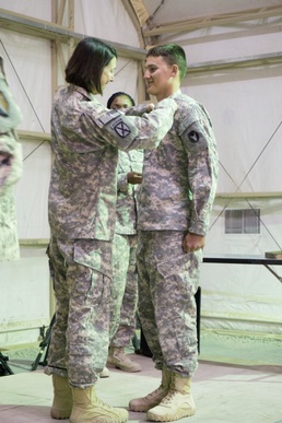 Two 34th CAB Soldiers earn prestigious Expert Field Medical Badge