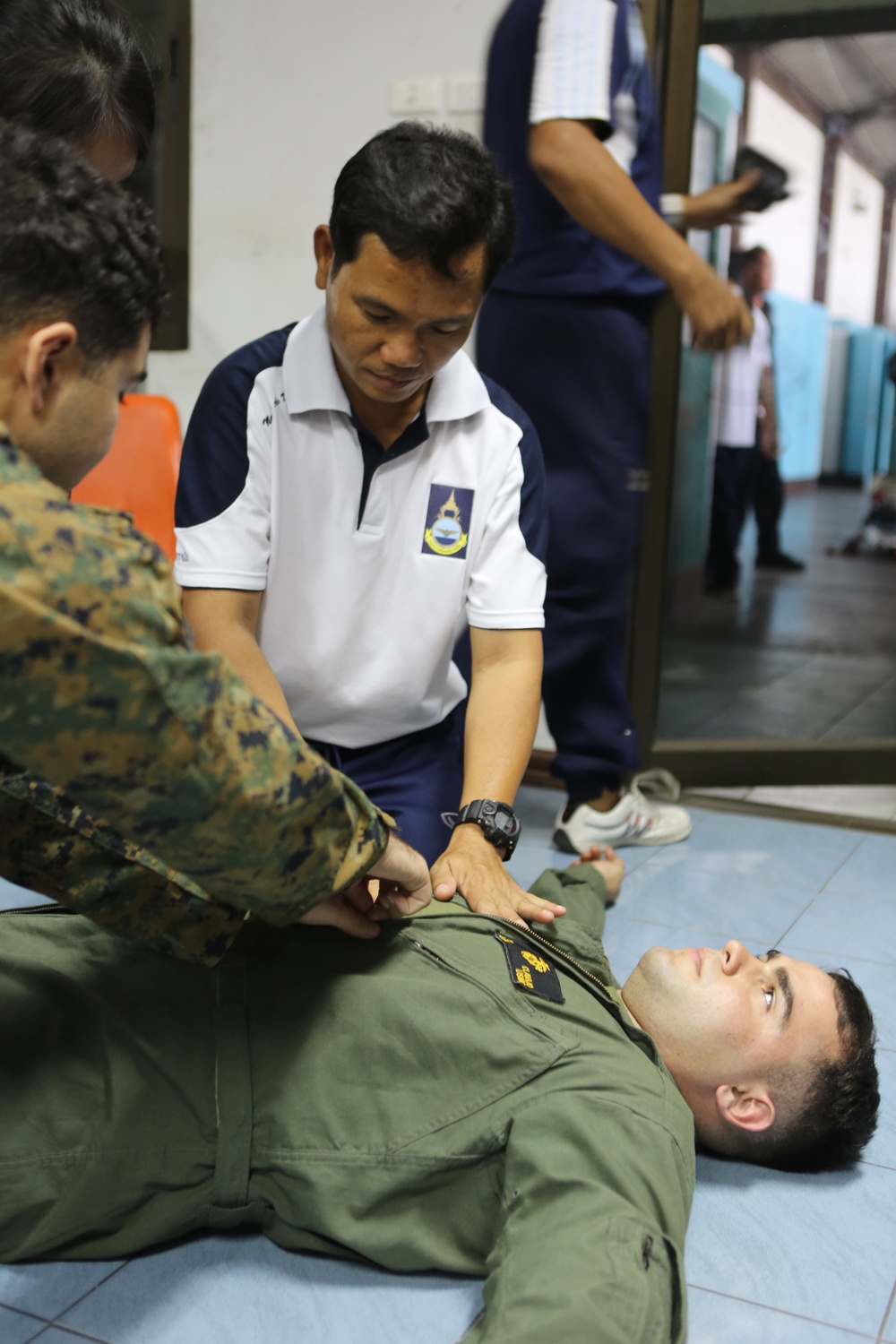 Corpsman, Marines, Thai Locals Practice Basic Life Support