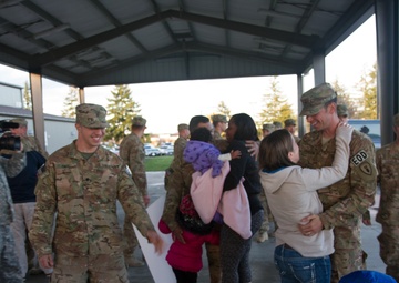 Family and friends gather to welcome Soldiers from the 787th Ordnance Company home from deployment