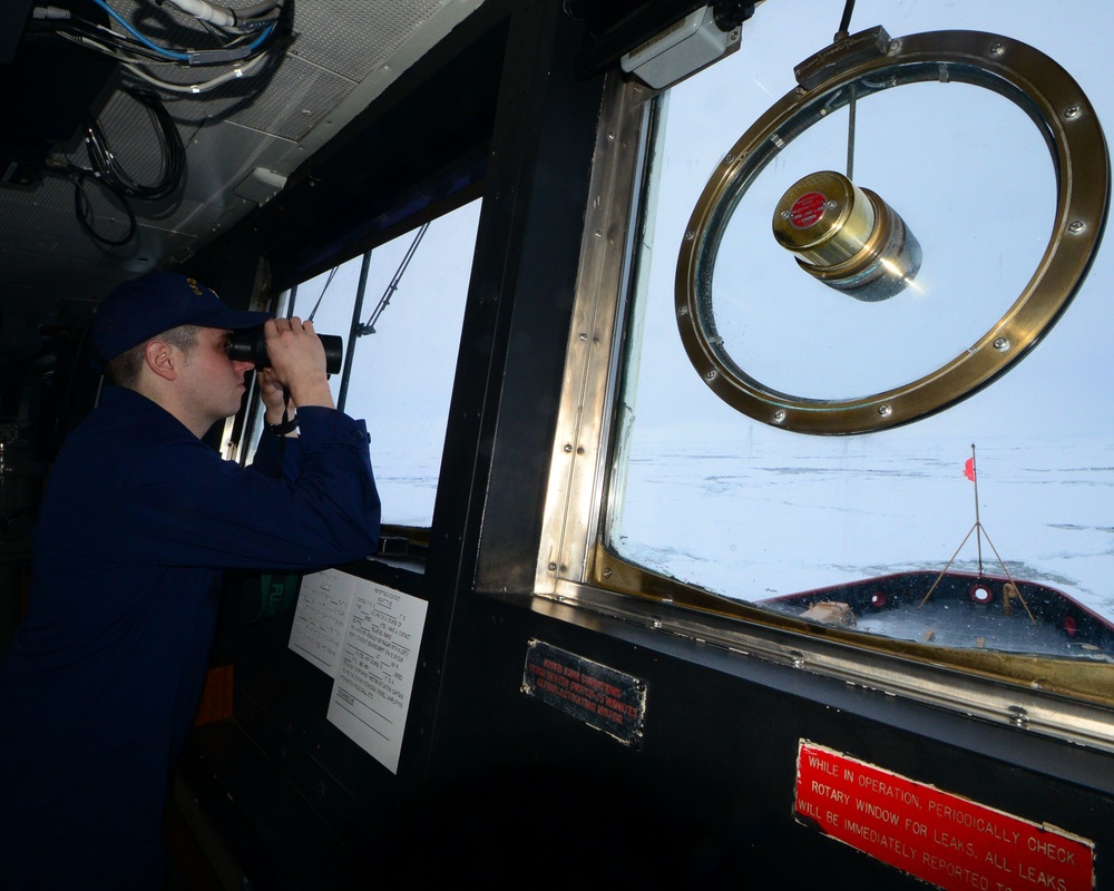 Coast Guard Cutter Polar Star navigates to beset fishing vessel