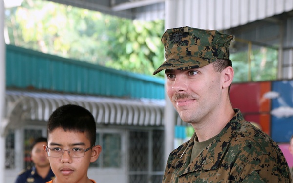 U.S. and Thai service members volunteer at school for disabilities