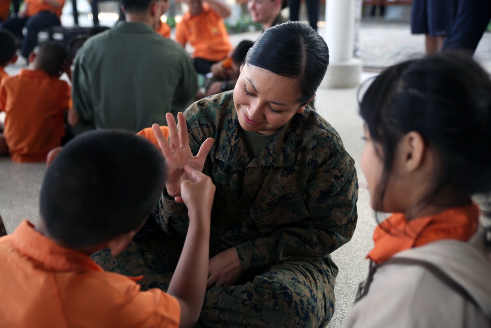 U.S. and Thai service members volunteer at school for disabilities