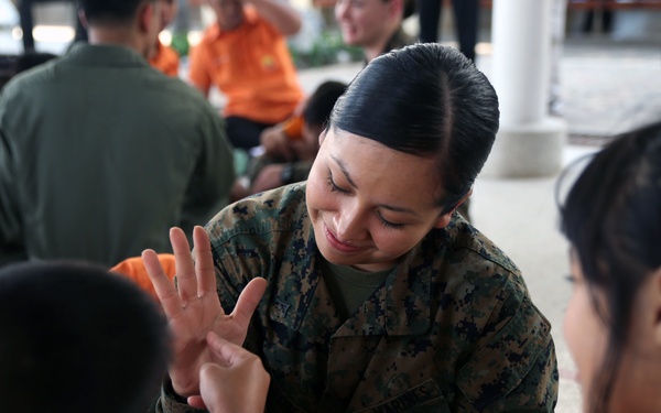 U.S. and Thai service members volunteer at school for disabilities