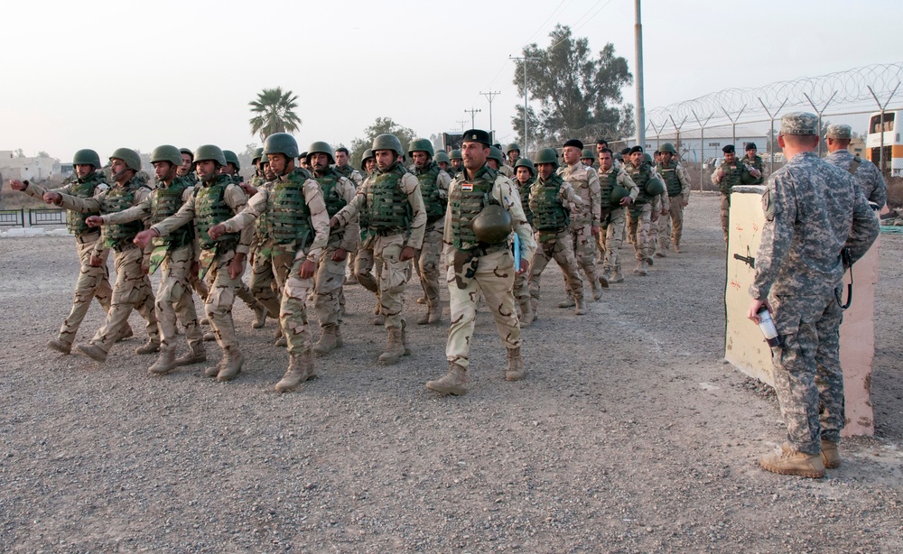 More than 1,400 Iraqi army soldiers graduate from 6-week training program with American advisers