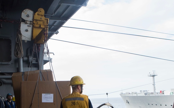 Marines and Sailors conduct a Replenishment at Sea