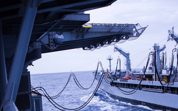 Marines and Sailors conduct a Replenishment at Sea