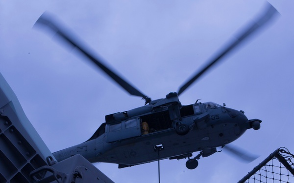 Marines and Sailors conduct a Replenishment at Sea
