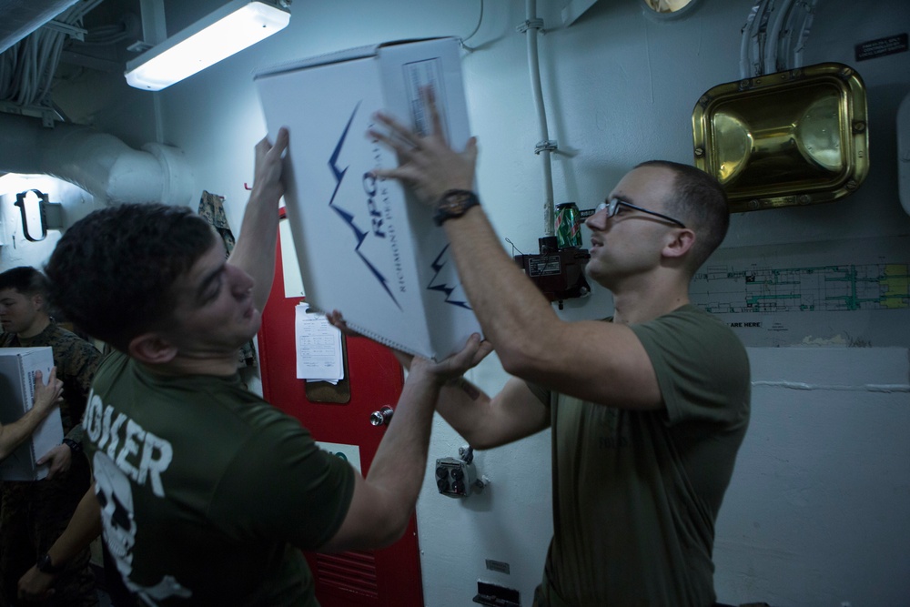 Marines and Sailors conduct a Replenishment at Sea