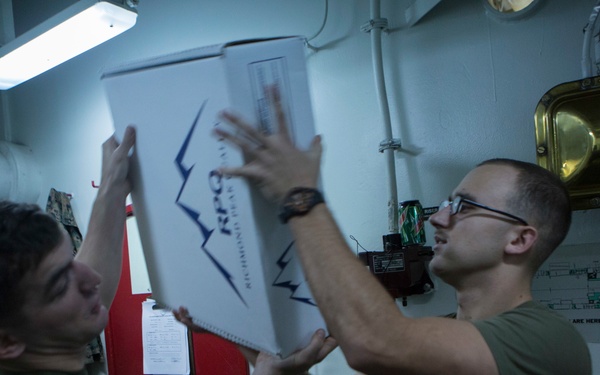 Marines and Sailors conduct a Replenishment at Sea