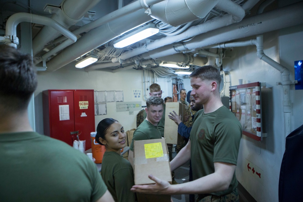 Marines and Sailors conduct a Replenishment at Sea