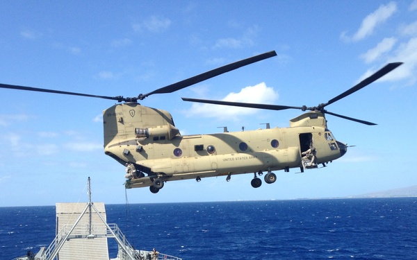 Pacific Waterborne, Air Assault, Aviation Soldiers work together during maritime rappel/sling load operations