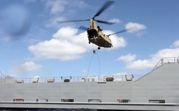 Pacific Waterborne, Air Assault, Aviation Soldiers work together during maritime rappel/sling load operations