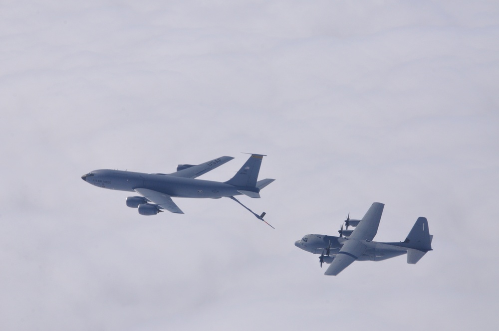 Tanker from Pittsburgh refuels a C-130 aircraft