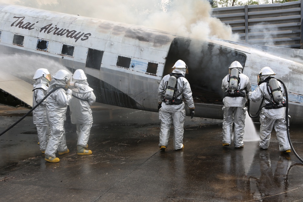 U.S. and Thai military firefighters test their crash, fire and rescue skills