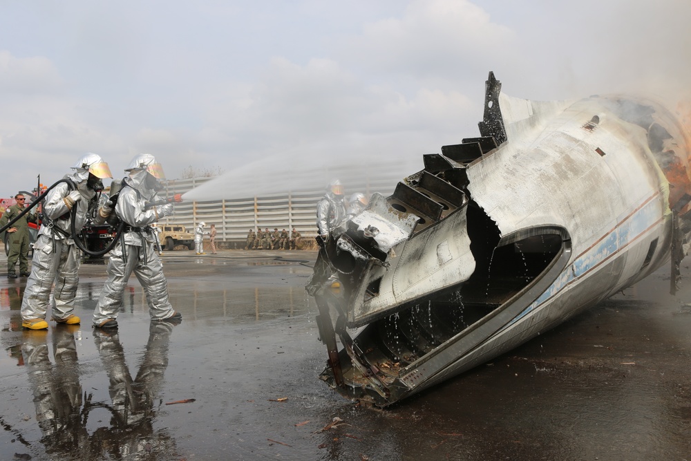 U.S. and Thai military firefighters test their crash, fire and rescue skills