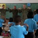 Service members, laugh, play, learn with Thai children during Cobra Gold 15