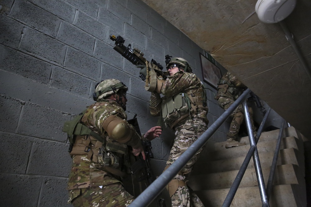 Georgian soldiers secure a building during the Situation Training Exercise