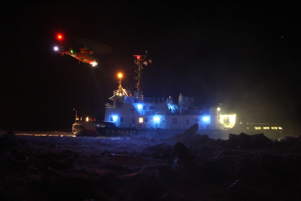 Coast Guard helicopter resupplies Coast Guard Cutter Bristol Bay