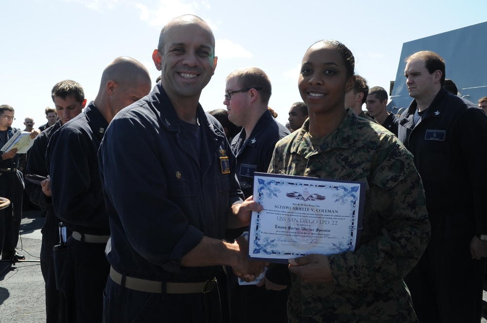 USS San Diego qualifies its first Marine enlisted surface warfare specialist