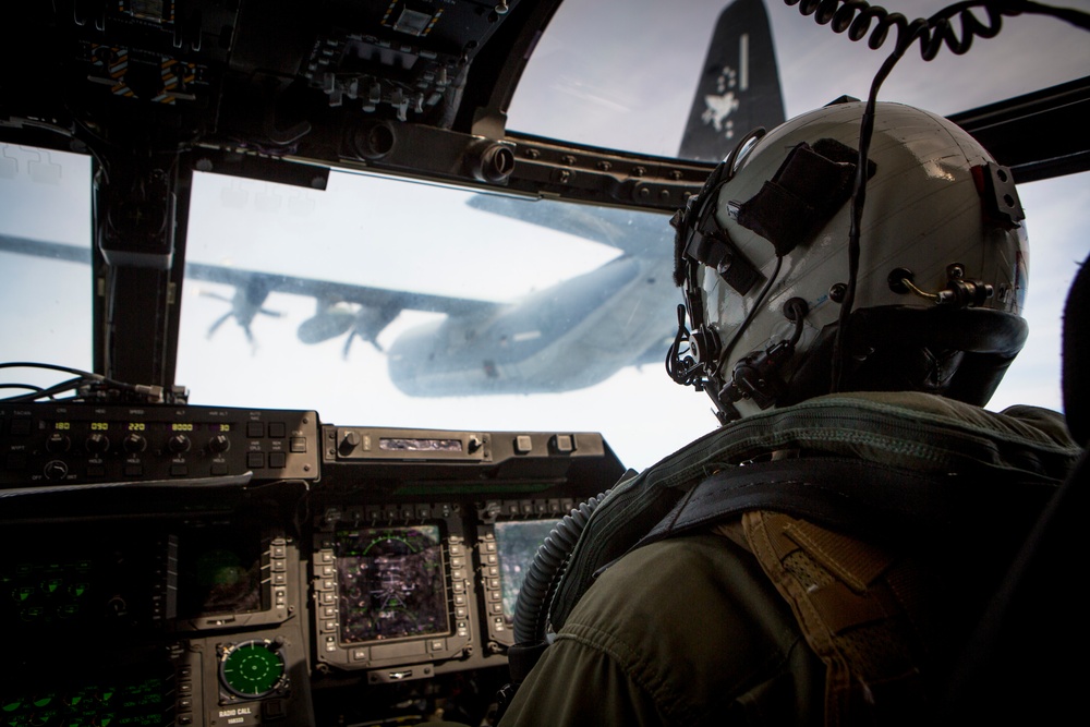 Headline: Go Anywhere: Crisis Response Marines complete air-to-air refueling from Spain