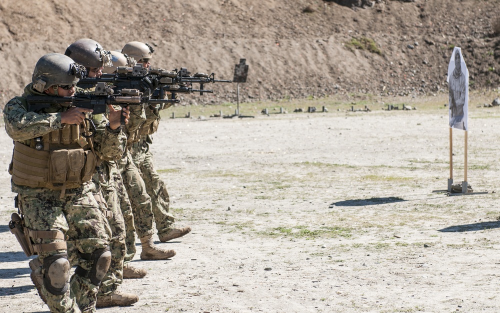 US military combat camera service members train in combat tactics