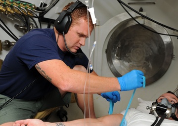Naval Base Guam diver locker demonstrate patient care