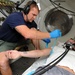 Naval Base Guam diver locker demonstrate patient care