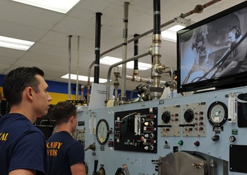 Naval Base Guam diver locker demonstrate patient care