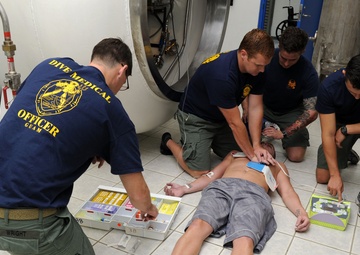 Naval Base Guam diver locker demonstrate patient care