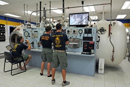 Naval Base Guam diver locker demonstrate patient care