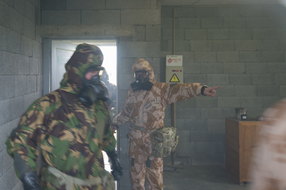 British forces practice CBRN procedures in a US Army facility