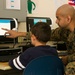 A Learning Community: U.S. Marines read with students in Spain