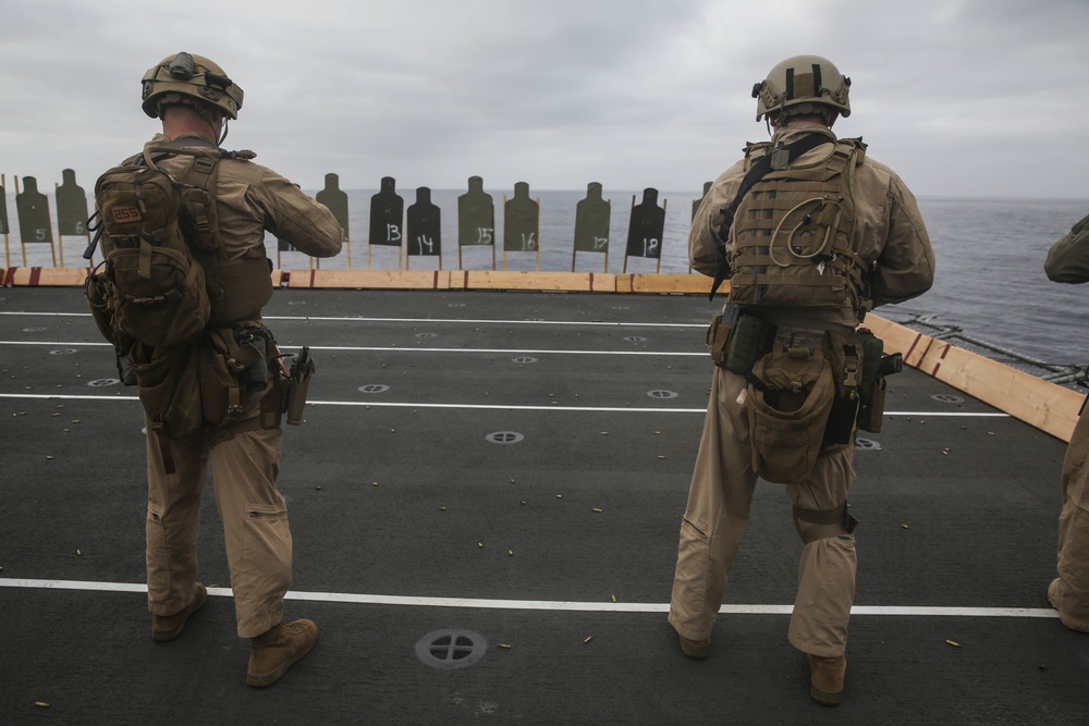 15th MEU Marines fire weapons during flight-deck quals