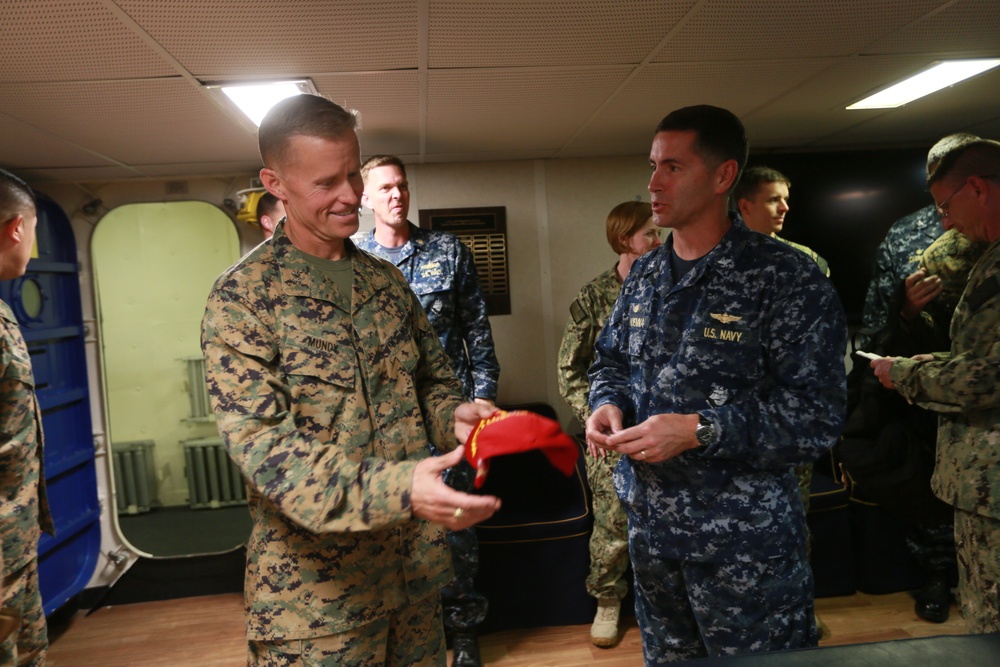 General Mundy visits USS Anchorage at sea