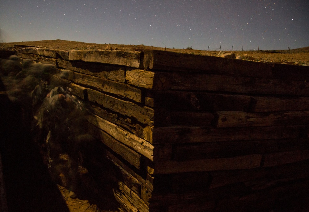 Soldiers breach an enemy compound