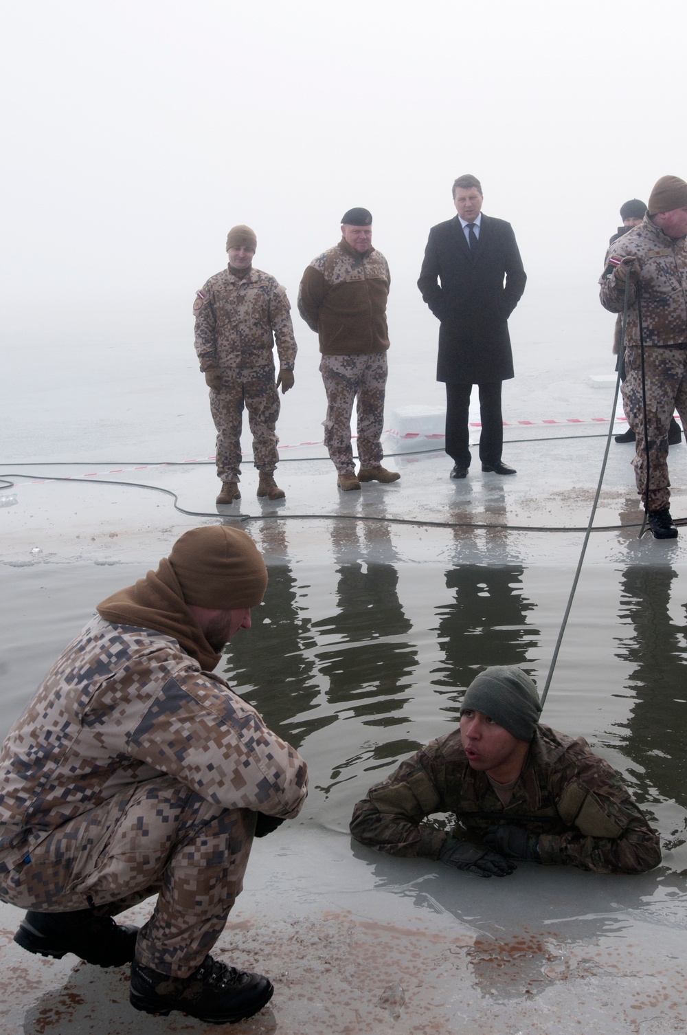 Troopers from 2nd Cavalry Regiment participate in Ice Plunge