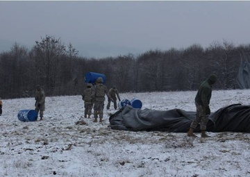 Quartermaster Soldiers conduct aerial delivery and fuel system supply point training