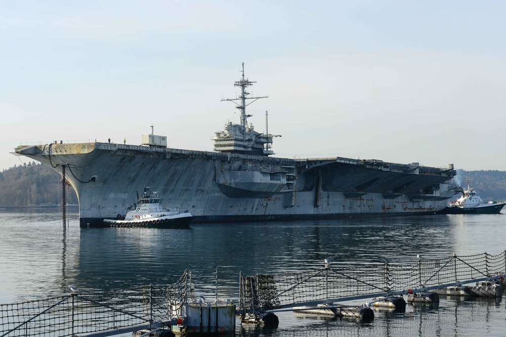 USS Ranger is towed away from Naval Base Kitsap-Bremerton