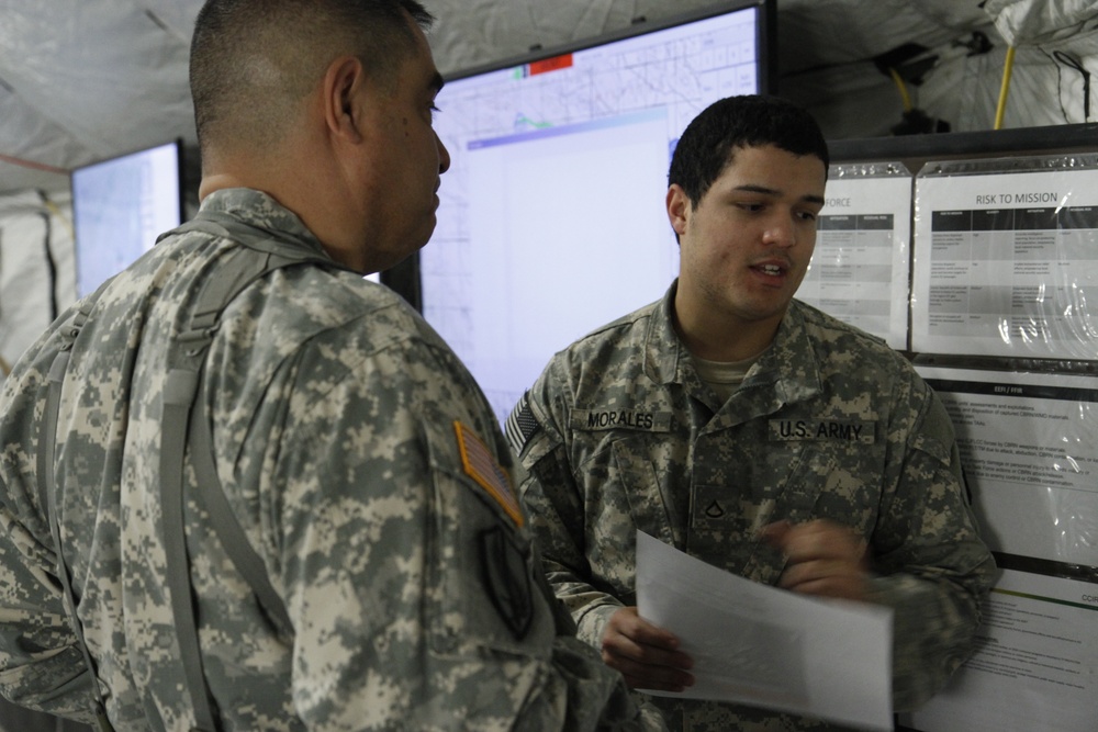 Brig. Gen. Jon D. Lee meeting soldiers of the 110th Chemical Battalion