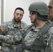 Brig. Gen. Jon D. Lee listens to an intelligence brief from the 90th Sustainment Brigade