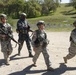 US Army soldiers and sailors conduct a movement on site 8J to assist other soldiers during the Combat Support Training Exercise