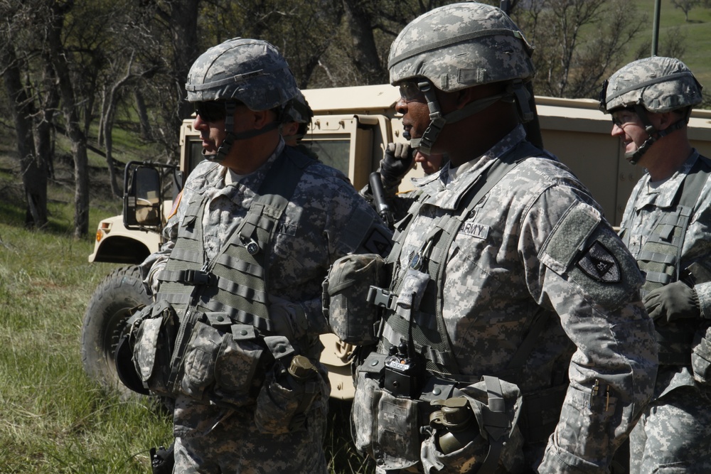 Brig. Gen. John D. Lee and Command Sgt. Maj. Gregory S. Chatman of the 91st Training Division visit soldiers during CSTX 91-15