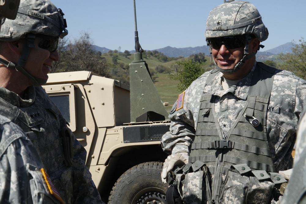 Lt. Gen. Stephen R. Lanza of I Corps and Brig. Gen. John D. Lee of the 91st Training Division talk about training exercises during the Combat Support Training Exercise (CSTX)