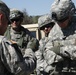 Lt. Gen. Stephen R. Lanza of the I Corps and Maj. Gen. James V. Young of the 75th Training Command listen to a brief from Col. Randall Wickman of the 189th Infantry Brigade