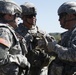 Brig. Gen. John D. Lee of the 91st Training talks to Maj. Gen. Lawrence A. Haskins of the 40th and Col. Jeffery D. Smiley of the 75th Infantry Brigade Combat team about the Combat Support Training Exercise (CSTX)