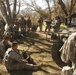 US Army Master Sgt. Matt Gould of the 91st Training Division conducts an after-action review with soldiers from the 209th Quartermaster Company