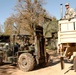 US Army Sgt. Christopher Lamarche and Staff Sgt. Rafael Vou of the 147th Medical Detachment load heaters on Base Camp Schoonover