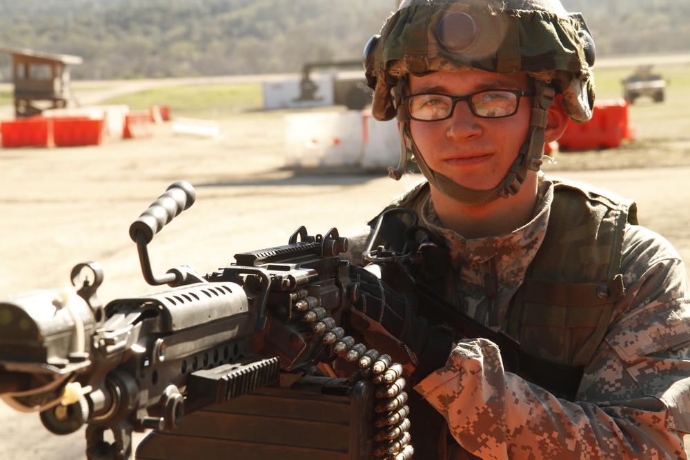 Cpl. Jayden O'Dell of the 872nd Support Maintenance pulls security with his M249 Squad Automatic Weapon